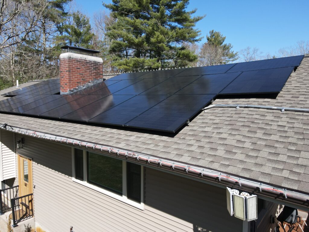 Close-up of black solar panels on residential roof by Sunfinity Power